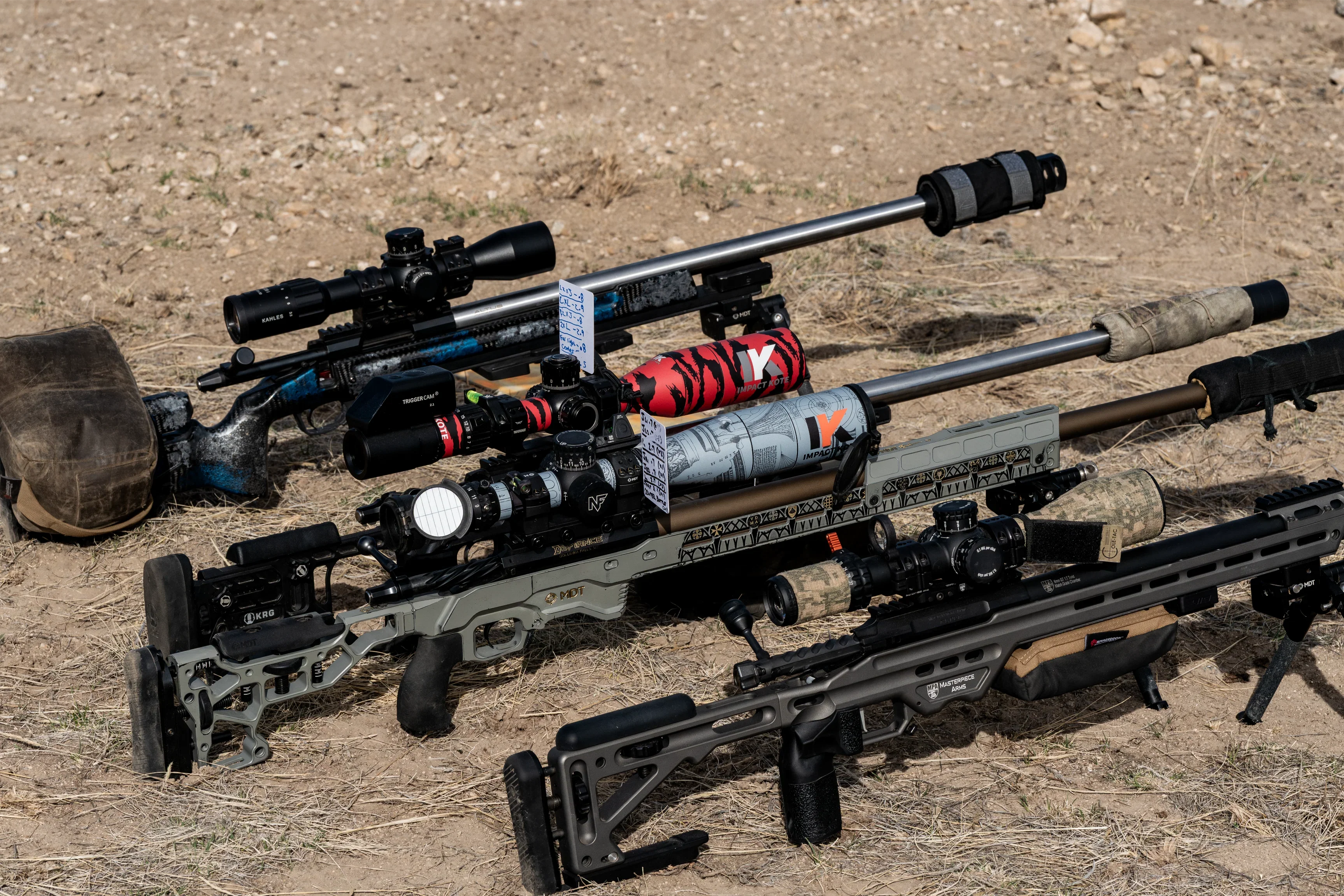 Impact Kote custom scope wraps on precision rifles at competition